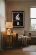 White cockatoo eating a cookie perched on a rusted metal bar with a dark background
