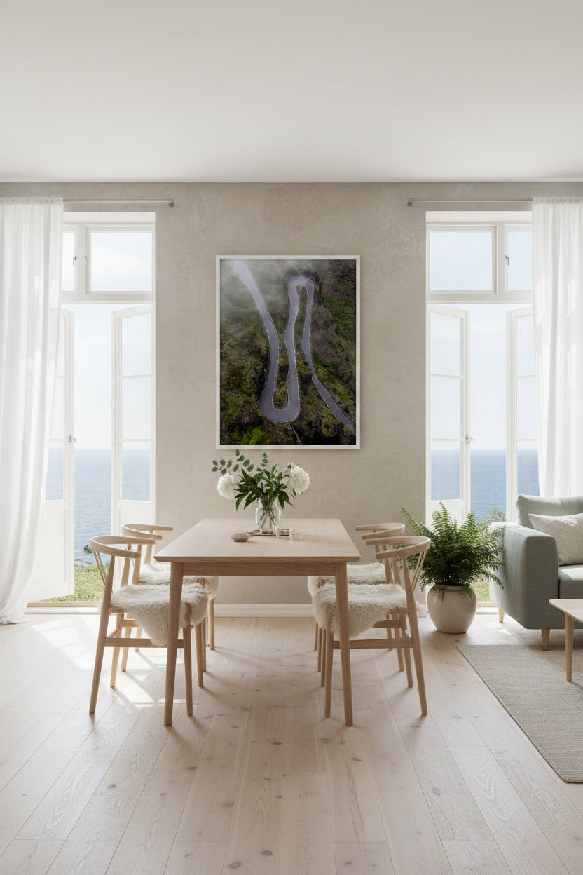 Winding road on a foggy mountain landscape