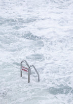 Bondi Icebergs ladders denoting pool closure during a storm swell