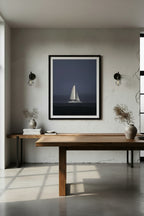 Sailboat on Sydney Harbour with in a rainy dark sky.