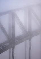Arches of the Sydney Harbour Bridge in winter fog