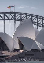The Sydney Opera House and Harbour Bridge standing side by side on a bright summer's day